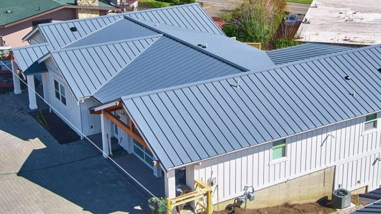 What are the benefits of a standing seam metal roofing system?